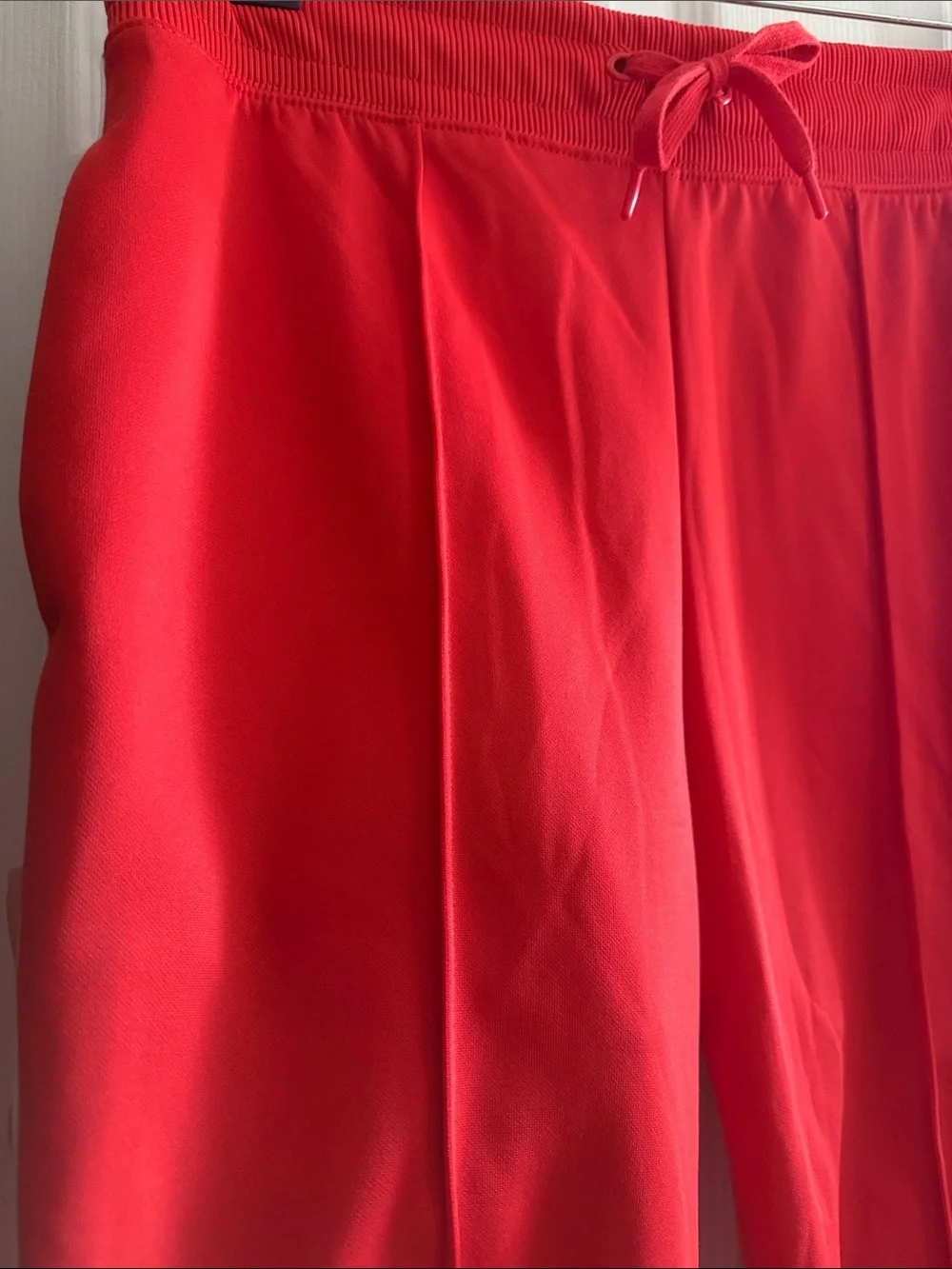 Nike Red Track Pants with White Logo Tape